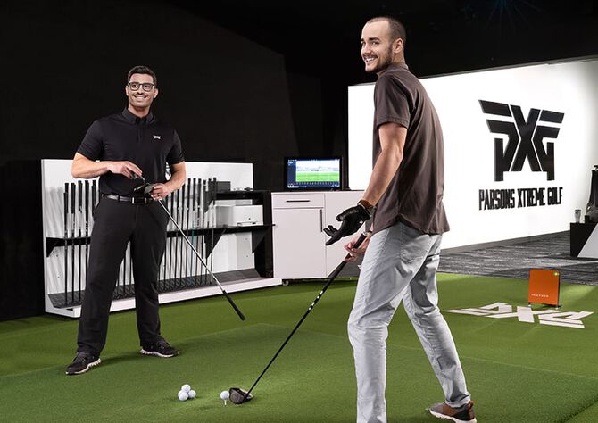 two guys getting fitted at pxg golf clubs