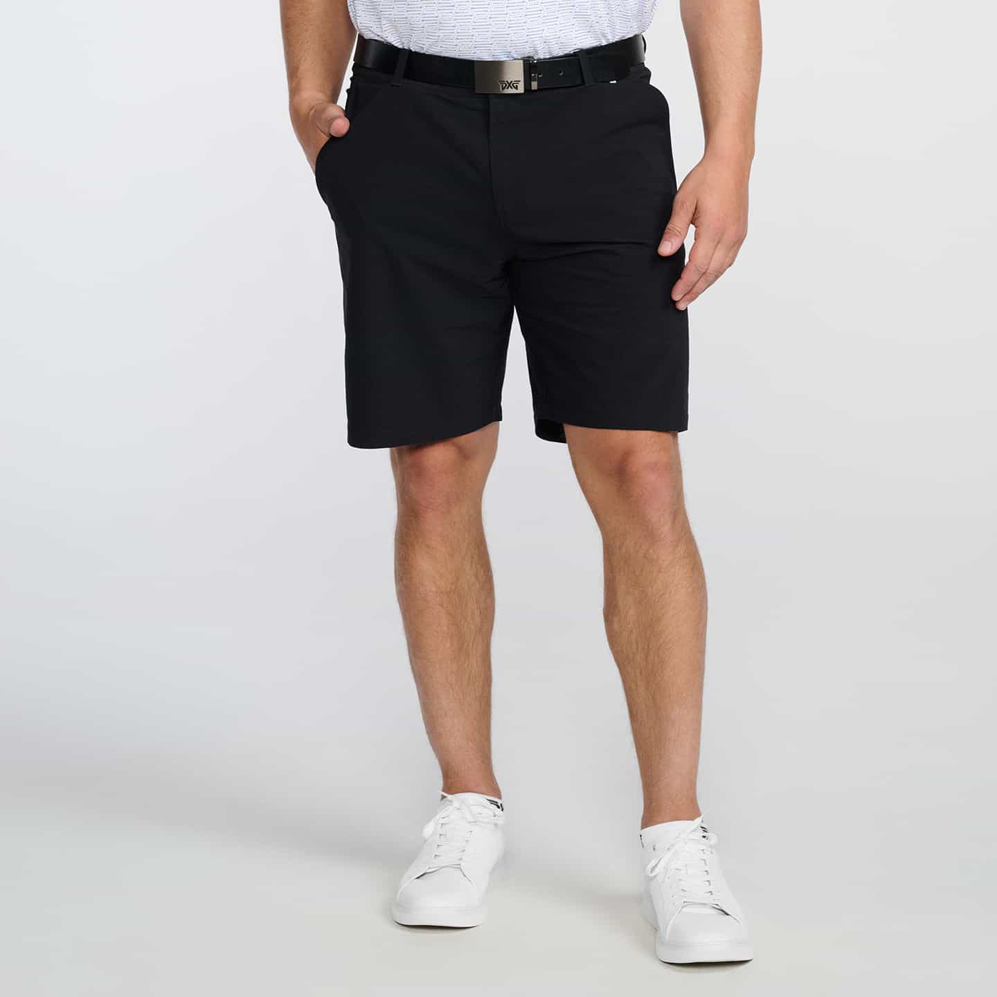 man wearing pxg polo and pants